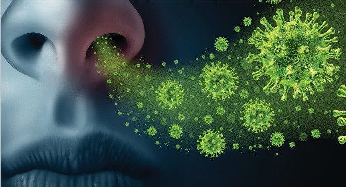 image of flu germs going into a person's nose