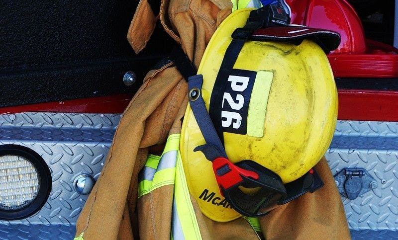 Firefighter coat and helmet  (Adobe Stock 3161418, weberfoto) 