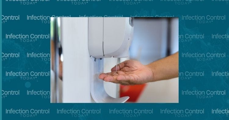 Close-up hand male under automatic alcohol gel dispenser for hand hygiene.  (Adobe Stock 364444583 by bigy9950) 