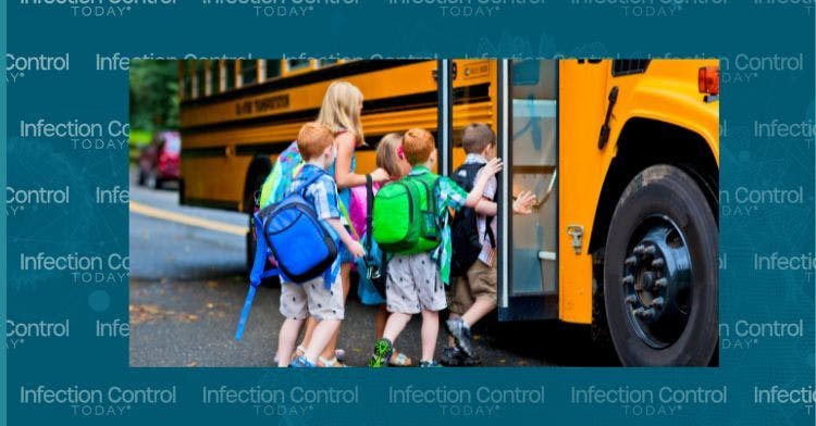 Students getting on a school bus  (Adobe Stock 90718131 by Stuart Monk)