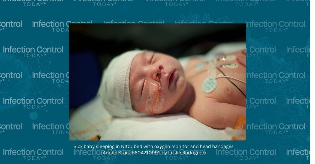 Sick baby sleeping in NICU bed with oxygen monitor and head bandages  (Adobe Stock 580421099 by Leslie Rodriguez)