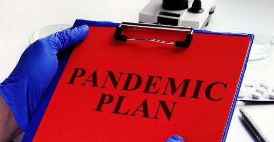 A clipboard with "Pandemic Plan"