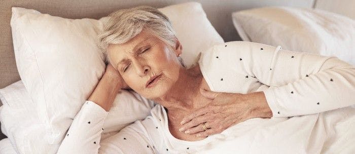 Older woman with influenza (Adobe Stock) 