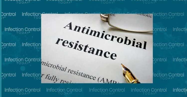 Paper with words antimicrobial resistance (AMR) and glasses.   (Adobe Stock 126570978 by Vitalii Vodolazskyi)